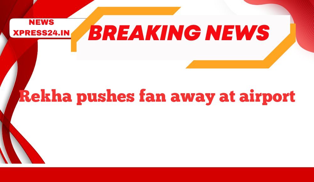 Rekha pushes fan away at airport